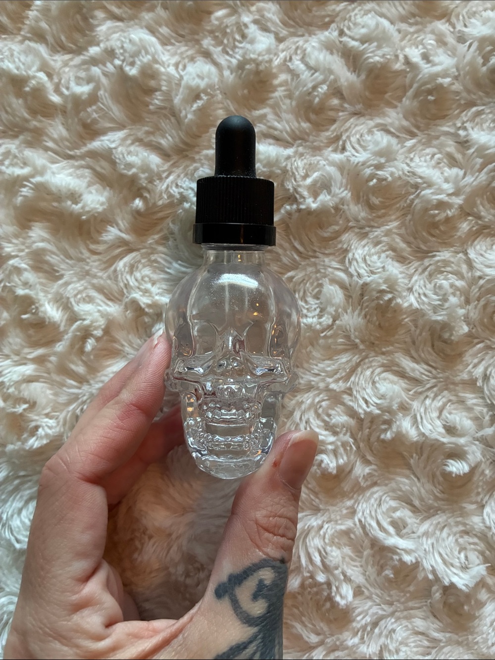 Skull-Shaped Glass Dropper Bottle with Black Rubber Top